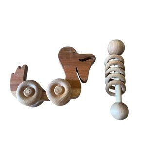 Montessori 100% wooden baby toys (rattle and pelican rolling toy)